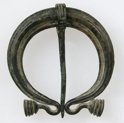 Pennanular or Omega Brooch
