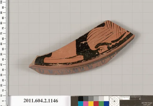 Terracotta fragment of a lekanis lid (covered dish)