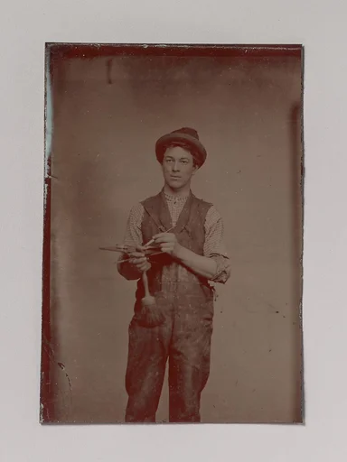 [Painter Holding Palette and Brushes]