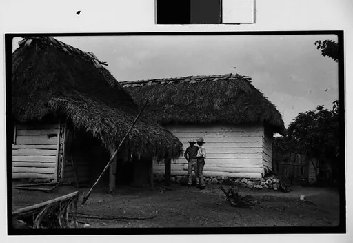 [Farmers in Front of Shanties, Cuba]
