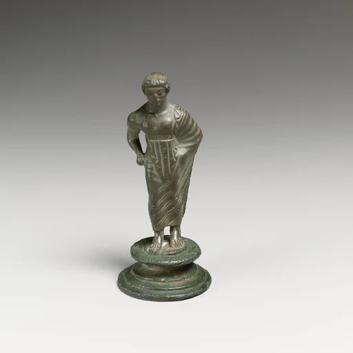 Bronze statuette of a draped youth
