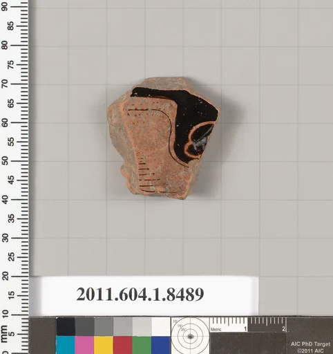 Terracotta fragment of a stemless kylix (drinking cup)