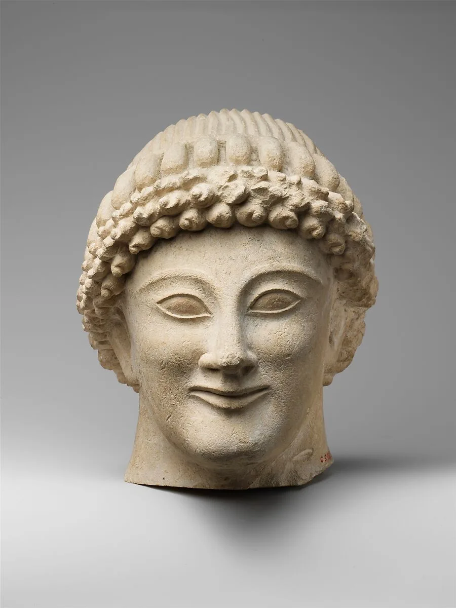 Limestone head of a youth — Unknown