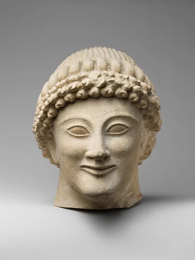 Limestone head of a youth
