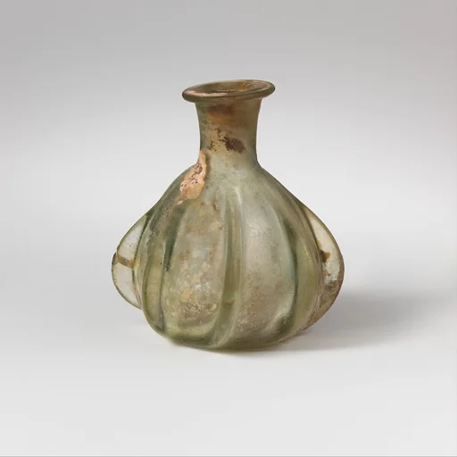 Glass ribbed bottle