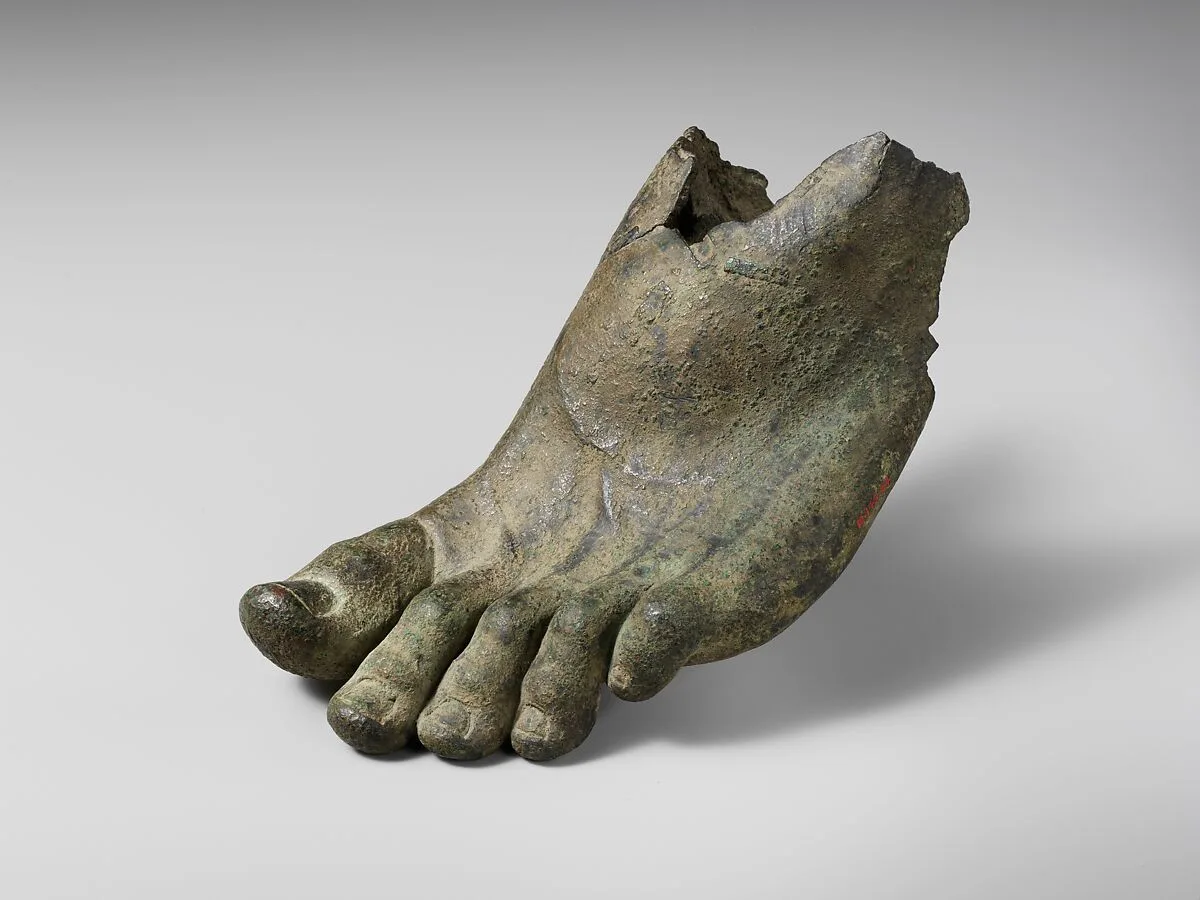 Bronze left foot with traces of sandal straps — Unknown