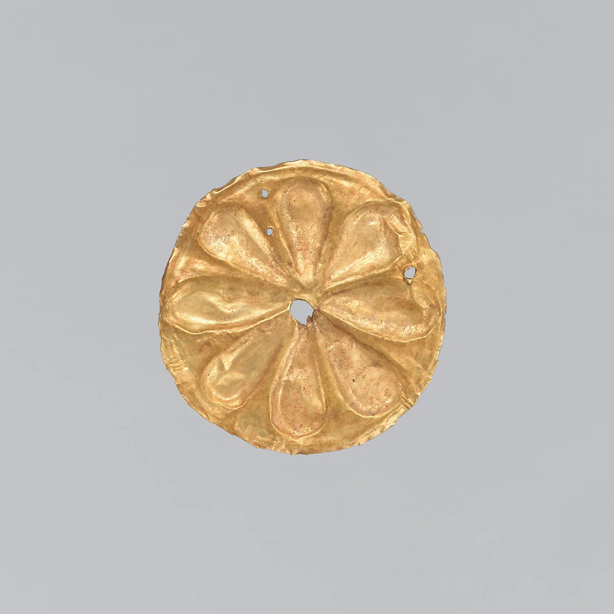 Gold roundel with stamped designs — Unknown