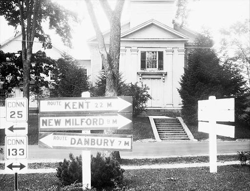 [Greek Revival Church with Roadside Highway and Route Signs in Foreground, Brookfield, Connecticut]