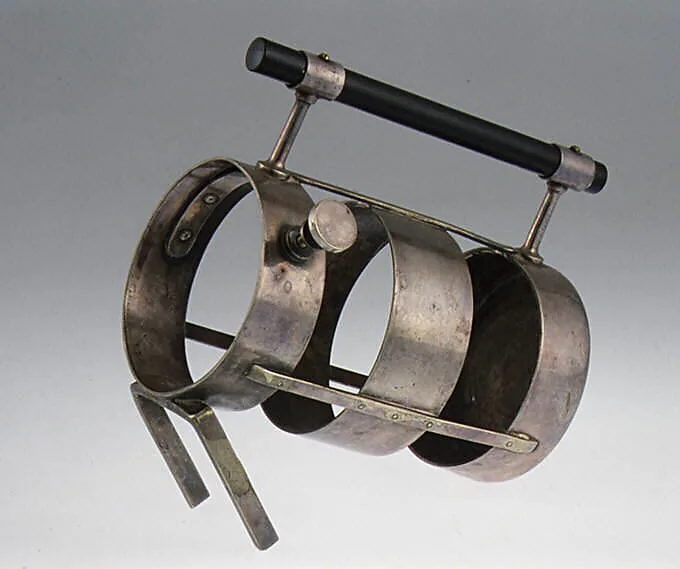 Wine bottle holder — Christopher Dresser|Hukin & Heath