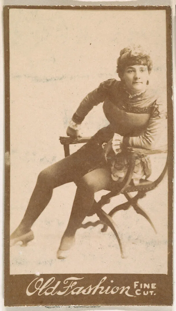 Actress seated on chair, from the Actresses series (N664) promoting Old Fashion Fine Cut Tobacco — Unknown