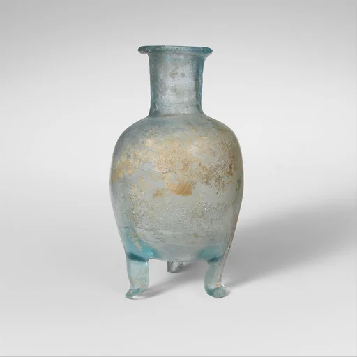Glass bottle with three feet