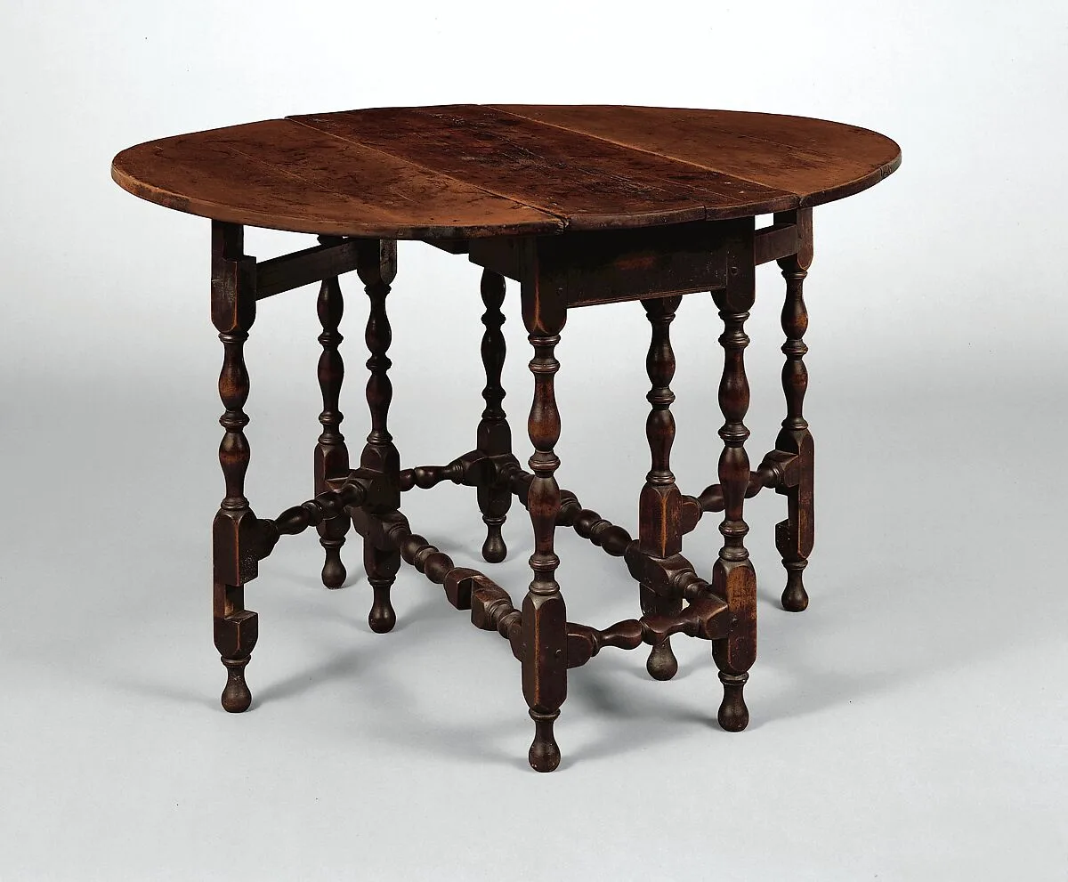 Oval table with falling leaves — Unknown