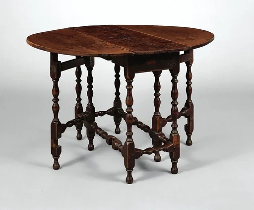 Oval table with falling leaves
