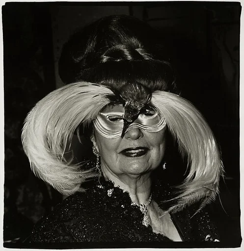 A woman in a bird mask, N.Y.C.