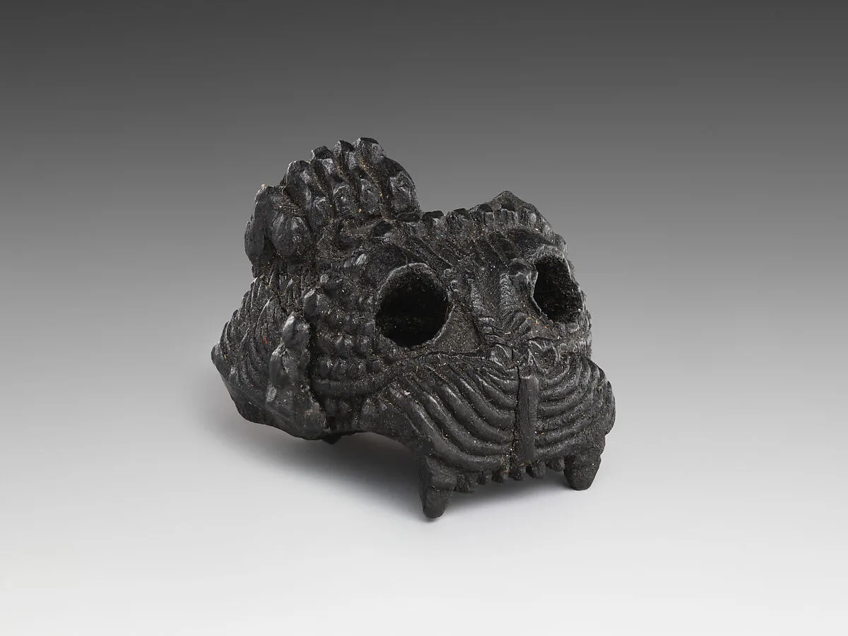 Upper part of a lion's head — Unknown