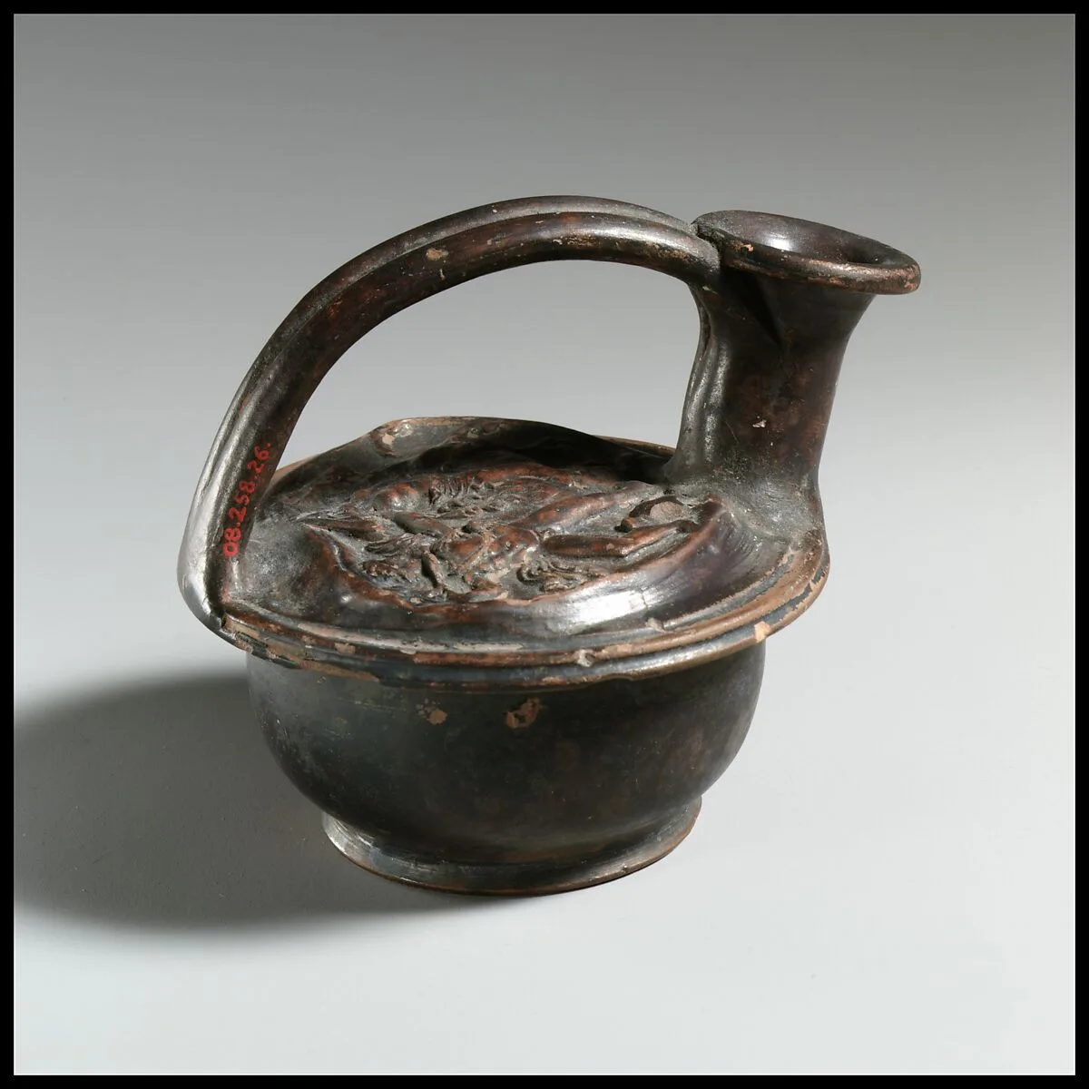 Terracotta askos (flask with a spout and handle over the top) — Unknown