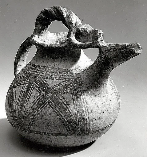 Spouted jar with geometric decoration
