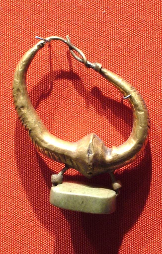 Ridged earring with an Egyptian Late Period hieroglyphic plaque as ornament