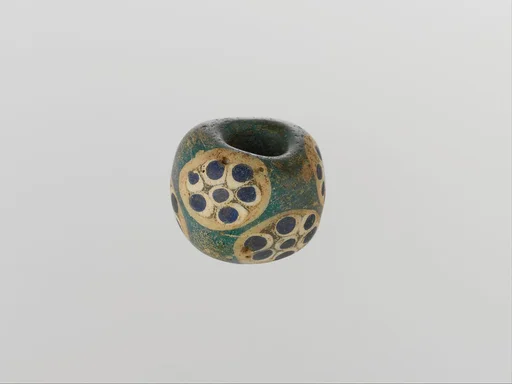 Glass compound eye bead