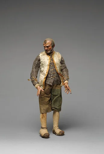 Bearded “Innkeeper” with white furry vest, black/white shirt, brown knickers