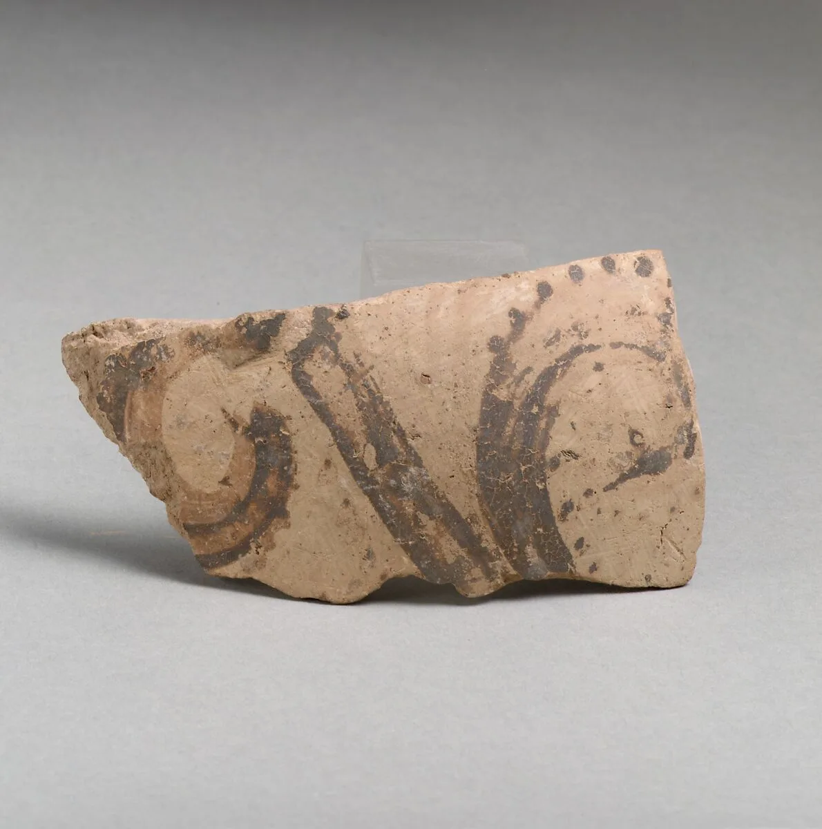 Terracotta vessel fragment with floral motif — Unknown