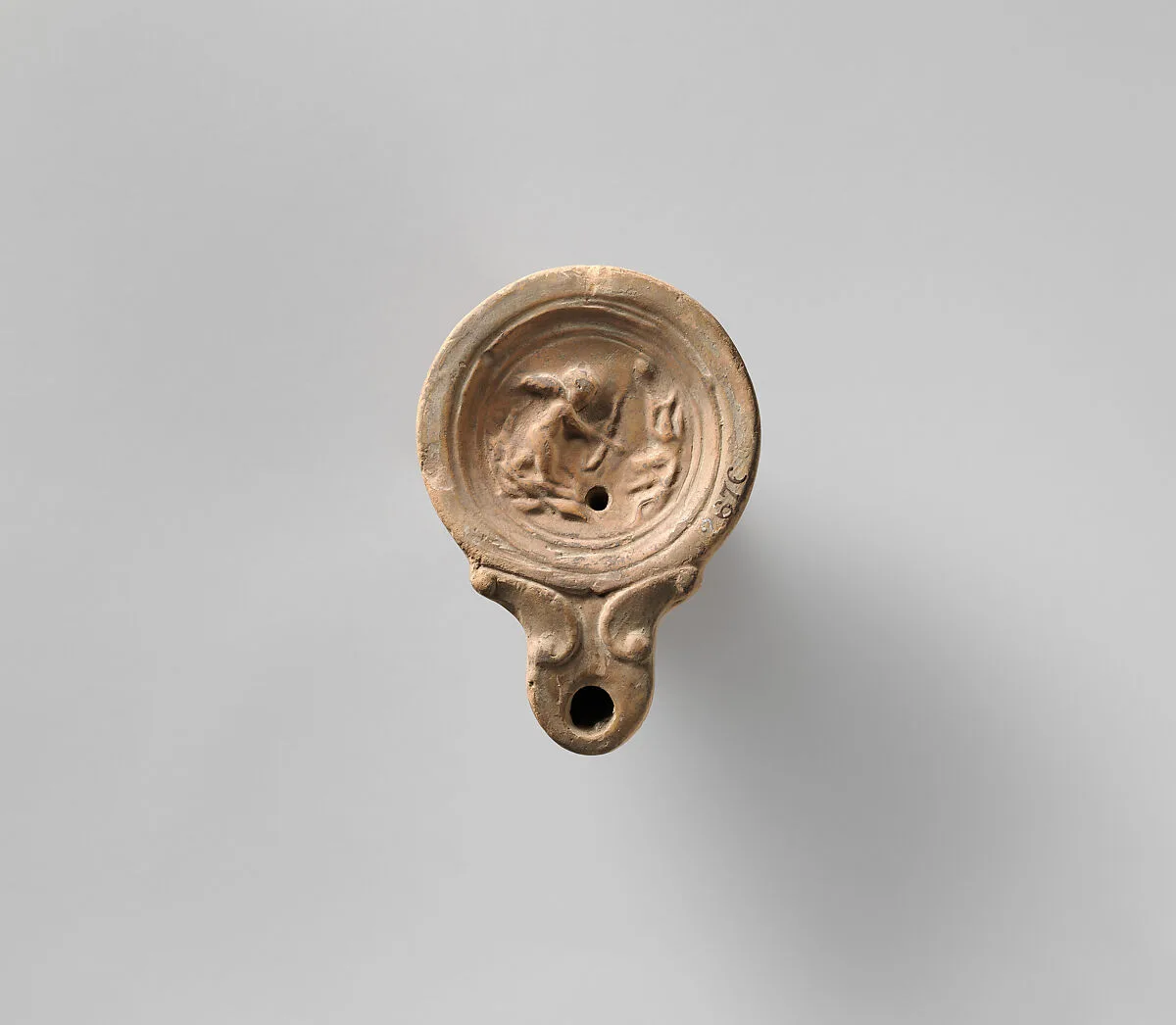 Terracotta oil lamp — Unknown