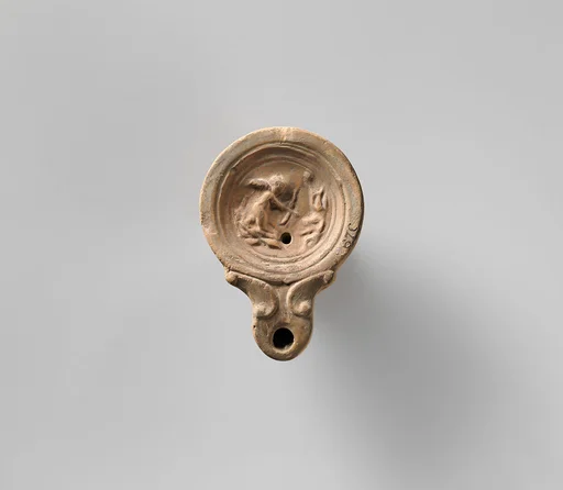 Terracotta oil lamp