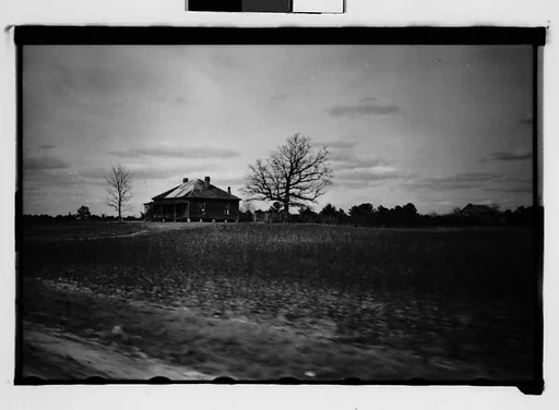 [Wooden House by Side of Road, From Moving Automobile, Macon, Georgia]