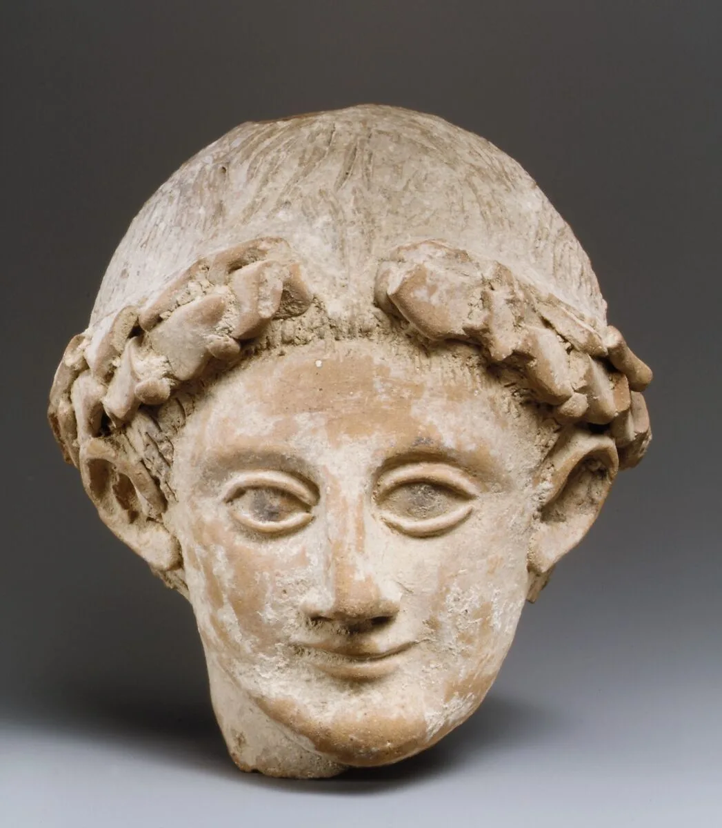 Terracotta head of a wreathed youth — Unknown