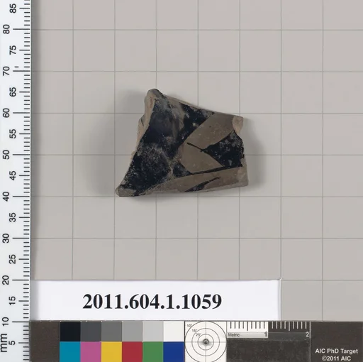 Terracotta fragment of a kylix (drinking cup)
