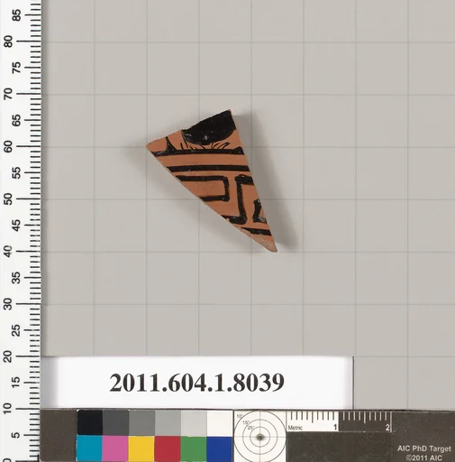 Terracotta fragment of a kylix (drinking cup)