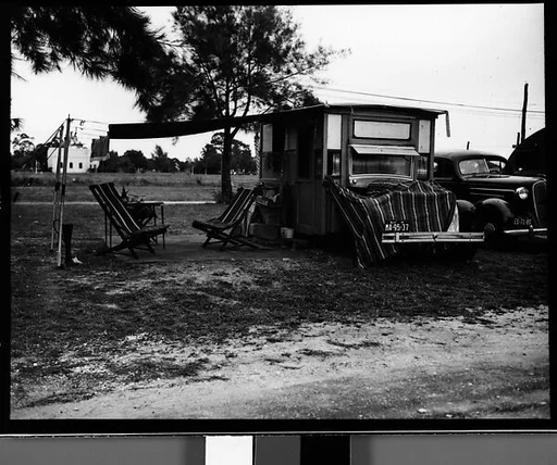 [Trailer with Canopy and Chairs in Camp, Florida]