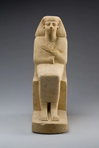 Statue of a Seated Man in a Cloak
