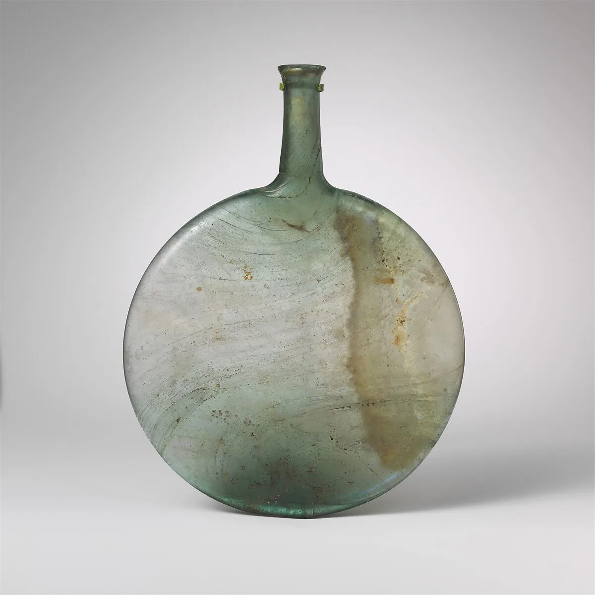 Glass lentoid bottle — Unknown