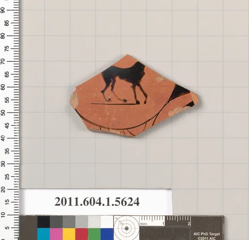 Terracotta fragment of a kylix (drinking cup)