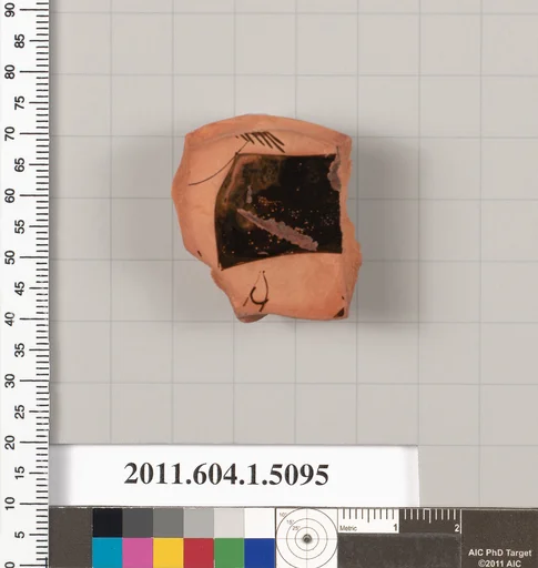 Terracotta fragment of a kylix (drinking cup)