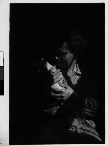 [Three 35mm Film Frames: Herbert Mayer with Chicken]