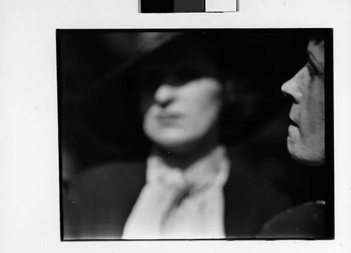 [Two 35mm Film Frames: Woman on Street]
