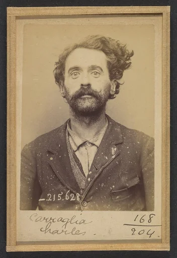 Carraglia. Charles. 39 ans, né à Moceto (It). Homme de lettres. Anar, infraction à la loi du 21/6/73. 13/3/94.