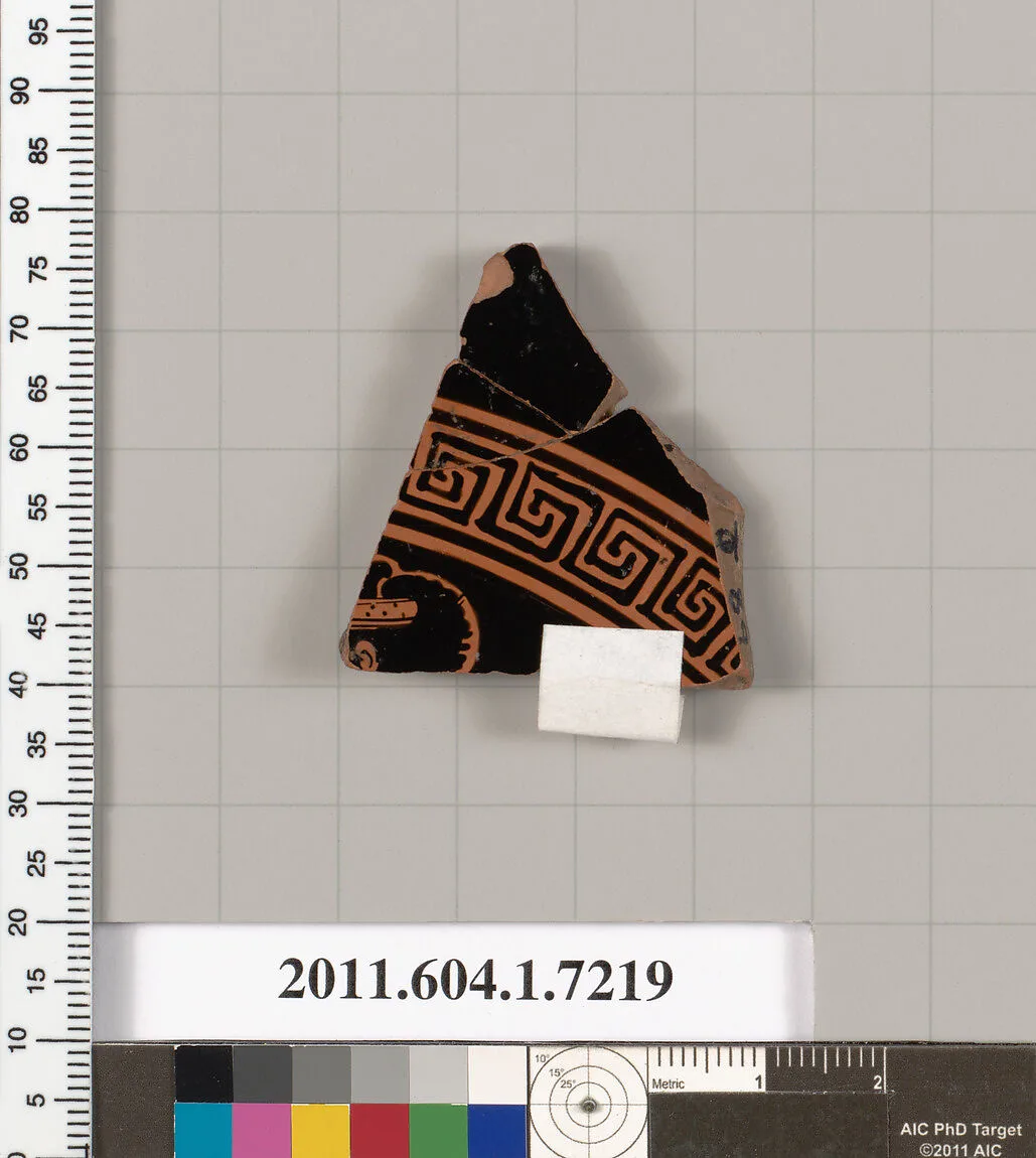 Terracotta fragment of a kylix (drinking cup) — Makron