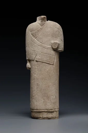 Incomplete figure in draped costume