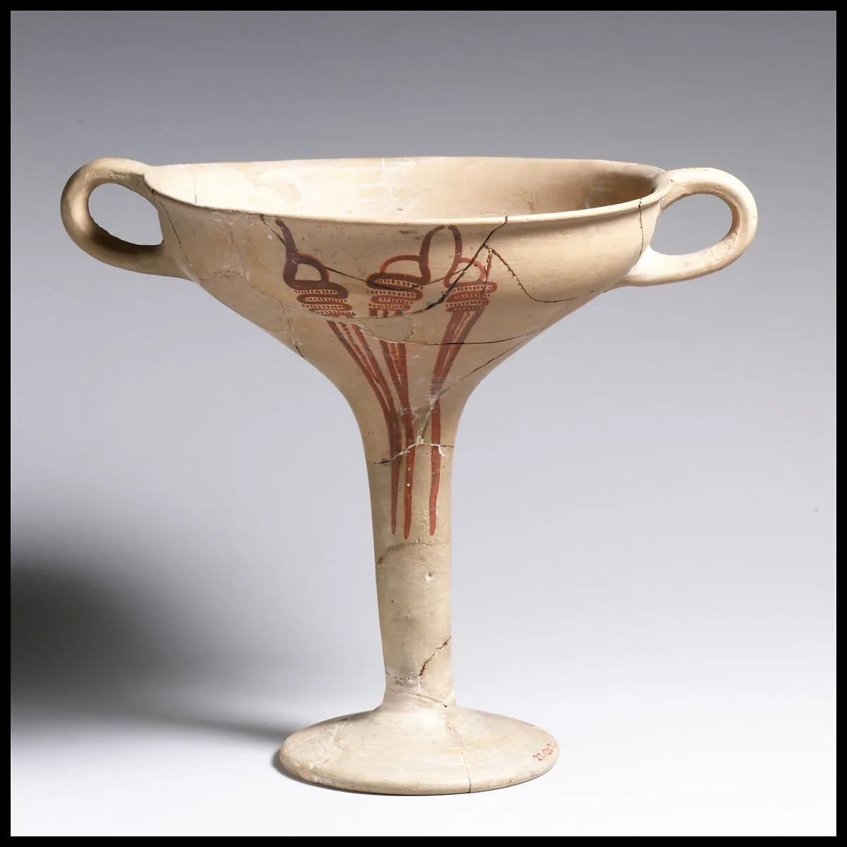Terracotta kylix (drinking cup) with whorl shells — Unknown
