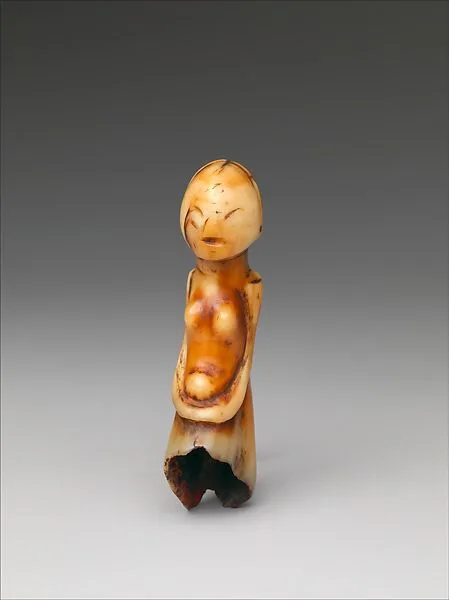 Pendant: Female Half Figure — Unknown