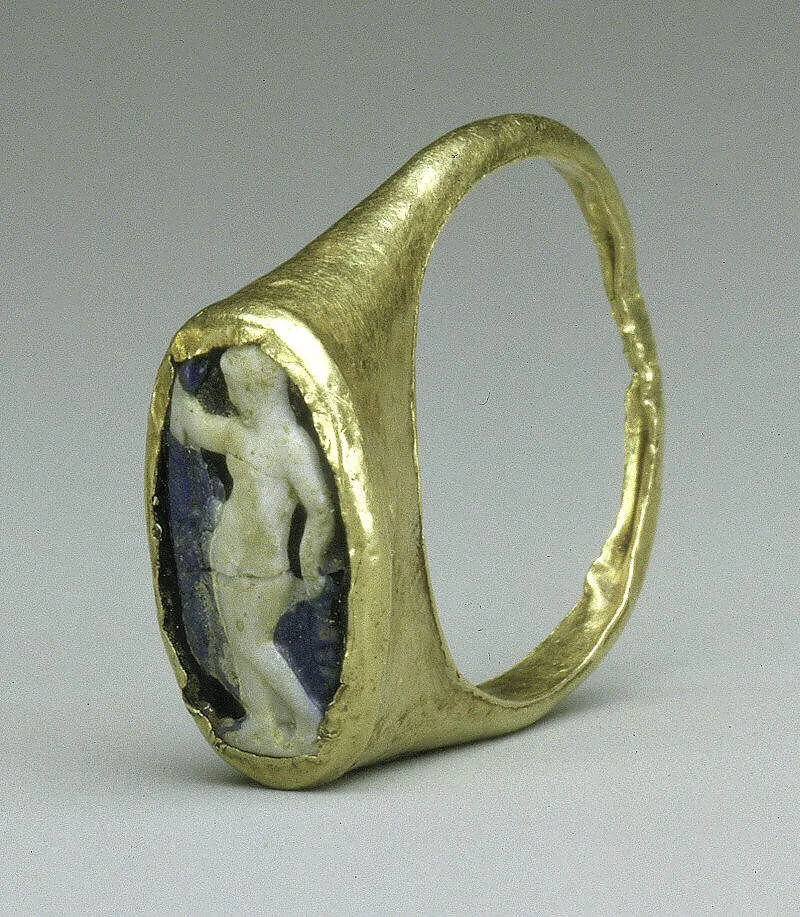 Gold ring with glass cameo in bezel — Unknown