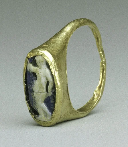 Gold ring with glass cameo in bezel