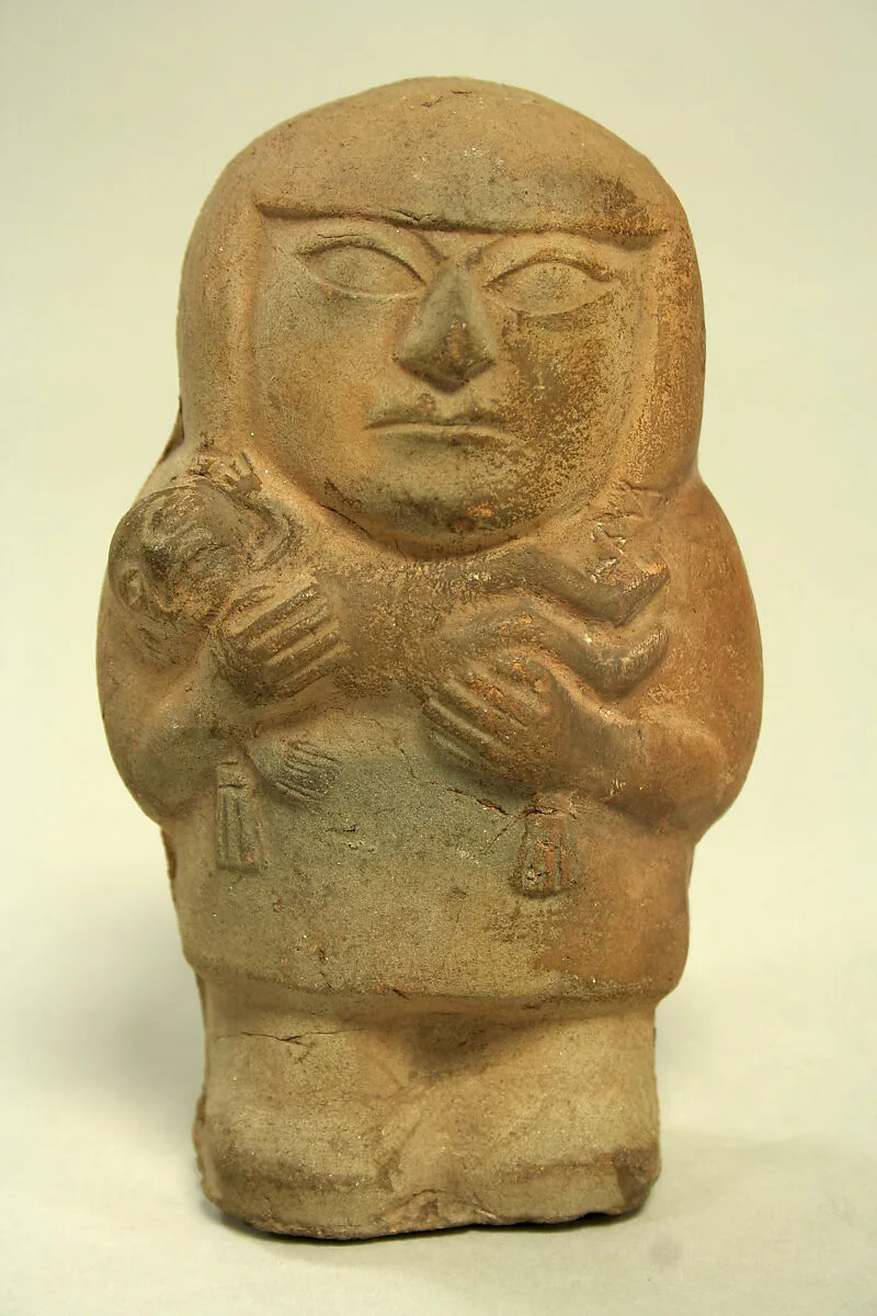 Figure of Mother Holding Child — Unknown