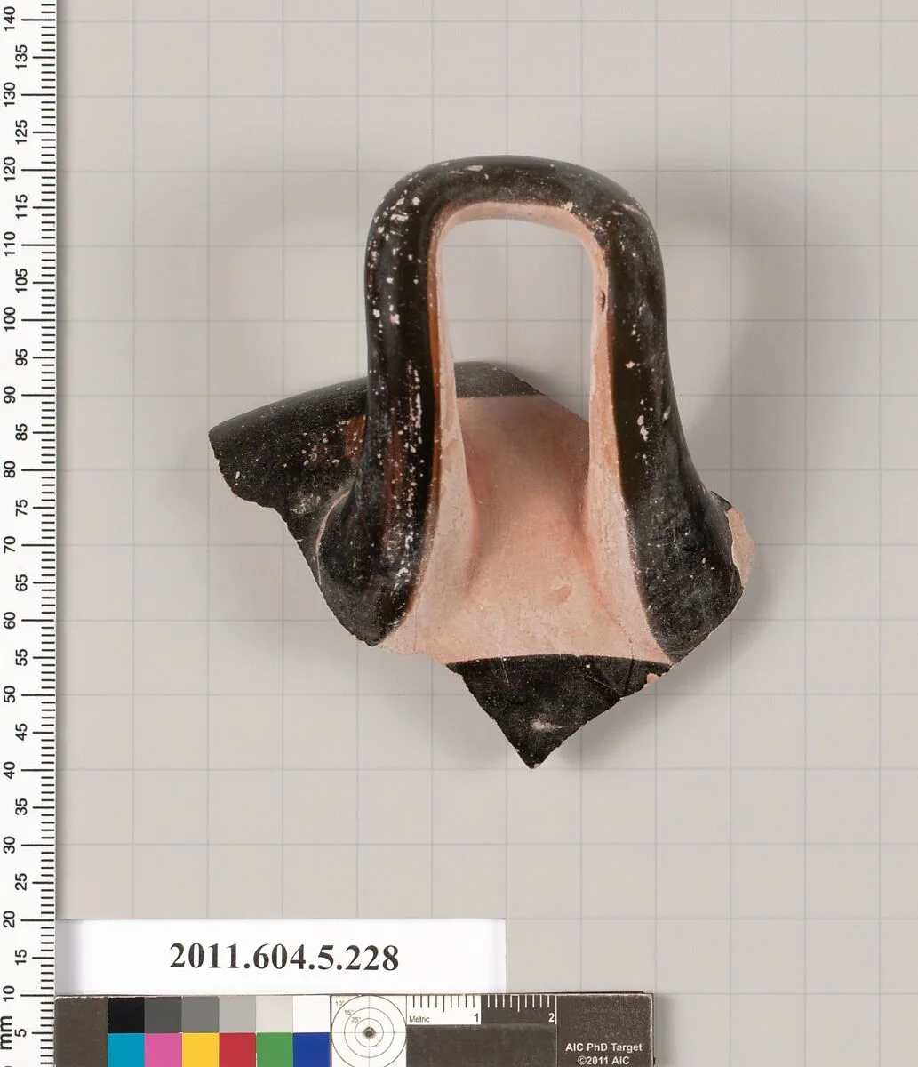Terracotta rim fragment of a kylix (drinking cup) — Unknown