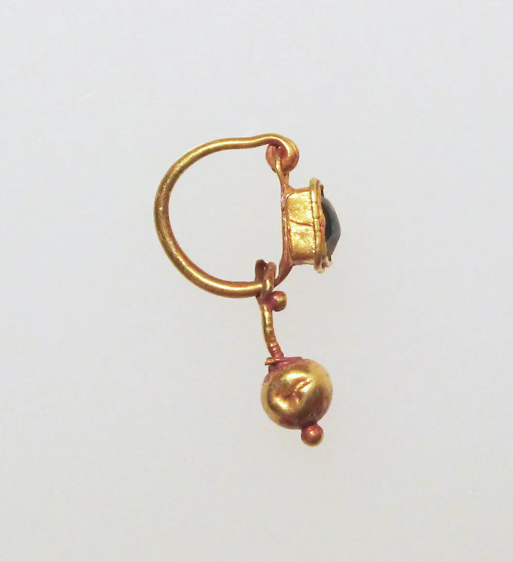 Earring with ball pendant and green stone setting — Unknown