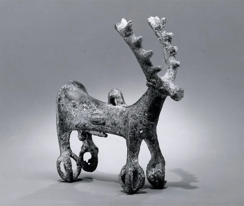 Stag pendant with bell feet — Unknown