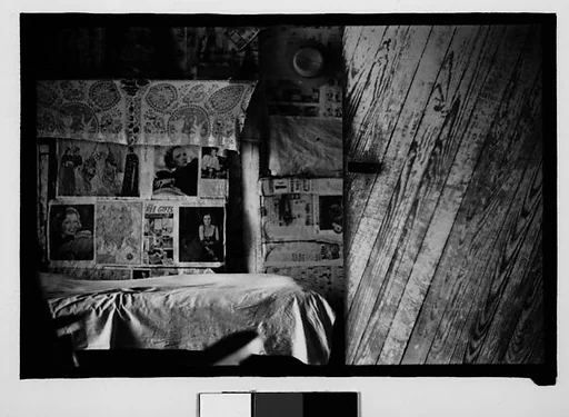 [Bedroom Interior with Newspaper-Covered Walls and Door, Hale County?, Alabama]